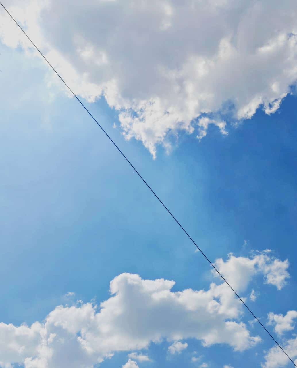 A photo of a blue sky with some clouds -- That beautiful sky is just an oven in disguise! 😂 